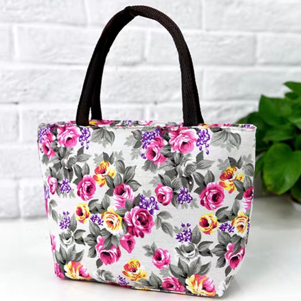 Womens floral print canvas handbag. New